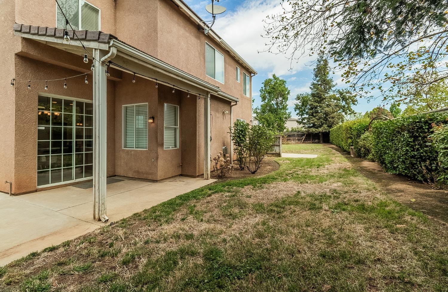 2595 Powers Avenue Coalinga, CA 93210 - Photo 33 of 34 a view of a house with a yard and plants