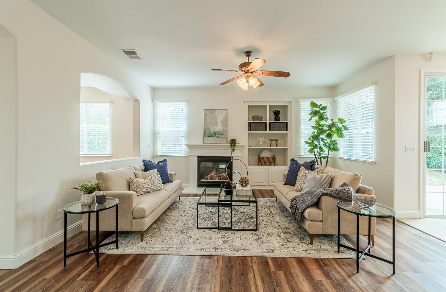 2595 Powers Avenue Coalinga, CA 93210 - Photo 5 of 34 a living room with furniture and a fireplace