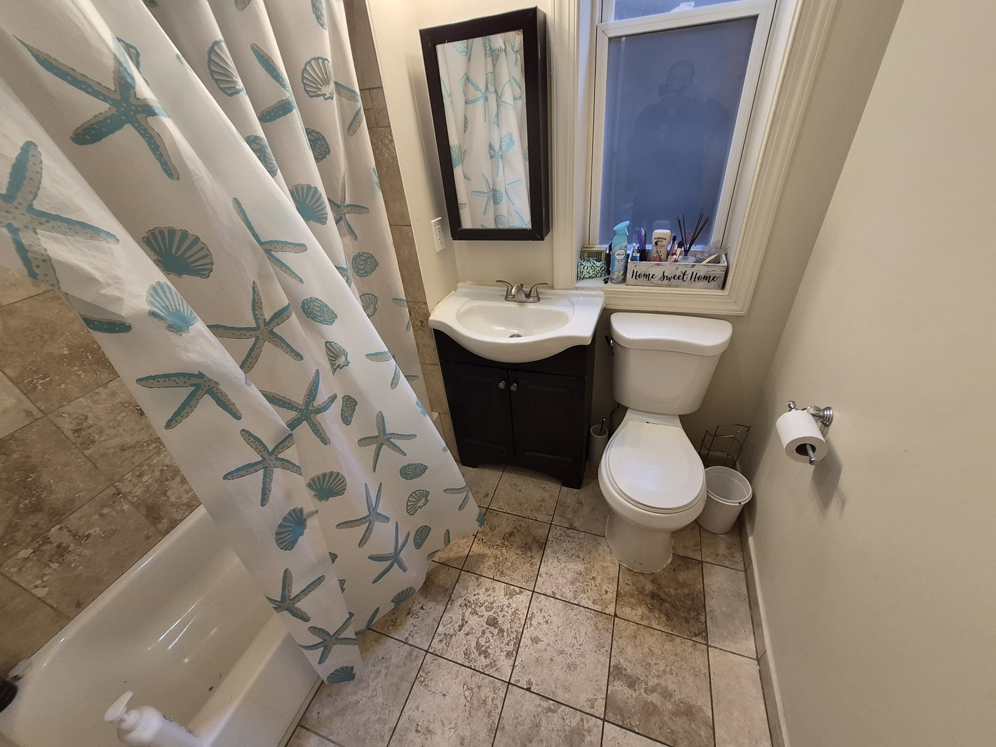 4126 West Adams Street Chicago, IL 60624 - Photo 4 of 19 a bathroom with a sink toilet and mirror