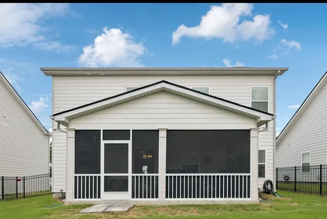 a sign on top of a wall