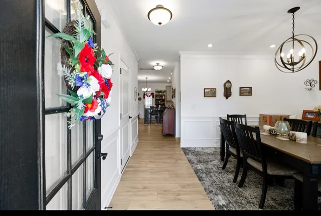 a view of a dining room with furniture