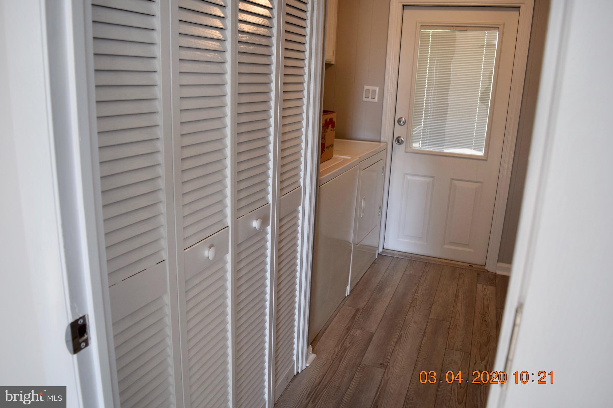 876 Old Forge Road Oxford, PA 19363 - Photo 17 of 27 new gray flooring in laundry room