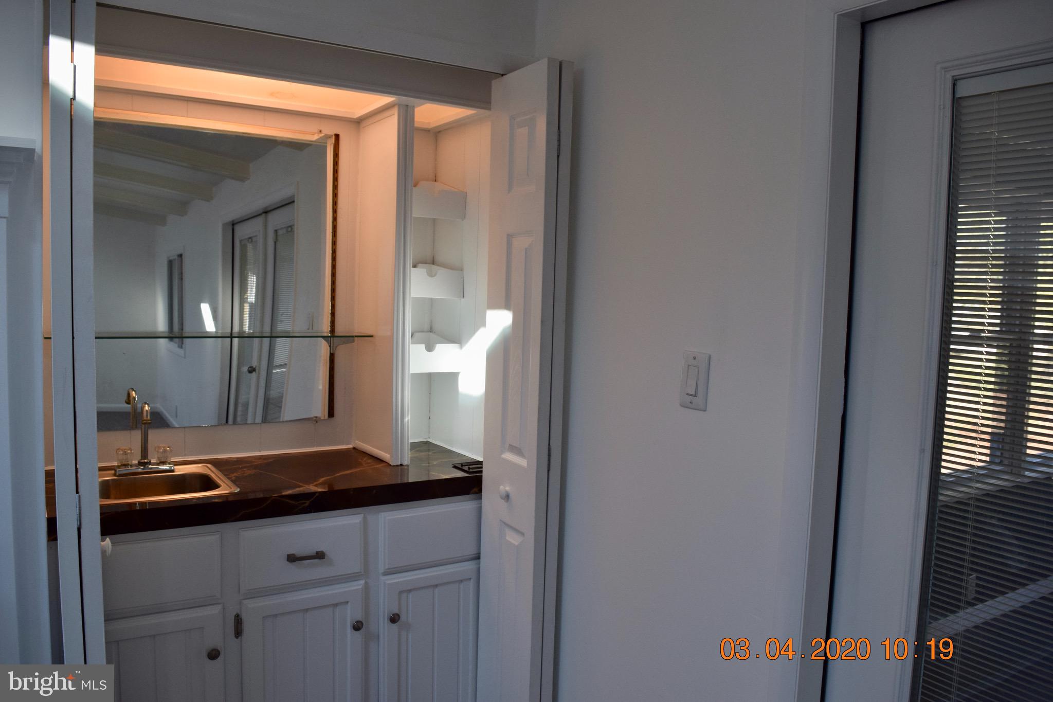 876 Old Forge Road Oxford, PA 19363 - Photo 10 of 27 wet bar in family room