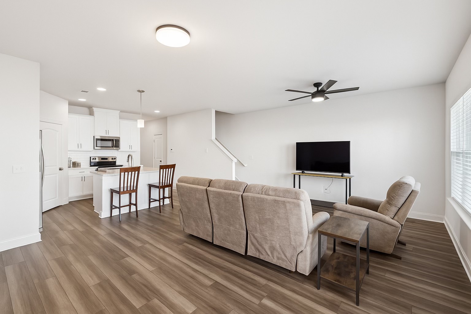 738 Prairie View Drive Columbia, TN 38401 - Photo 12 of 38 a living room with furniture and a flat screen tv