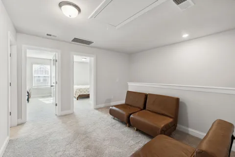 a view of livingroom with furniture and closet