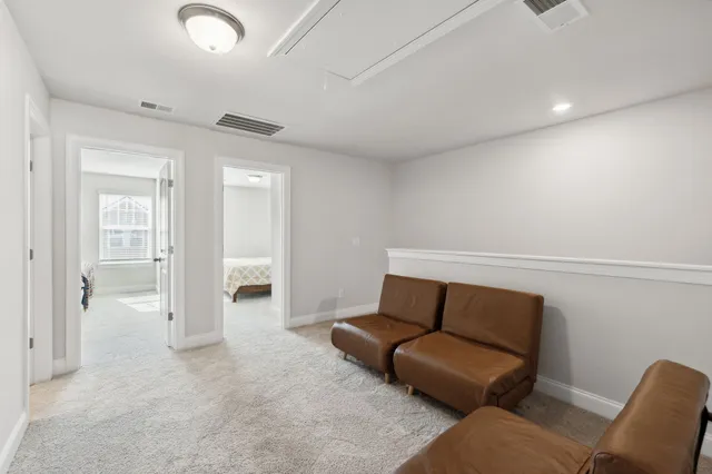 a view of livingroom with furniture and closet