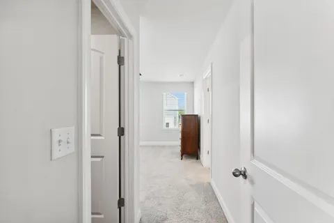 a view of a bathroom with mirror