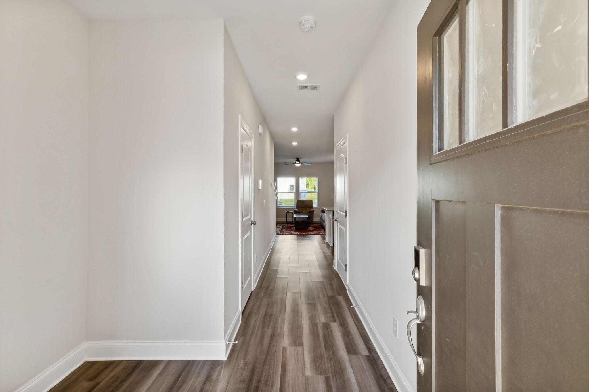 738 Prairie View Drive Columbia, TN 38401 - Photo 3 of 38 a view of a hallway with wooden floor and staircase