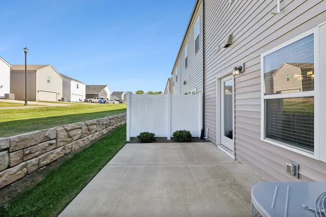 a view of a back yard of the house