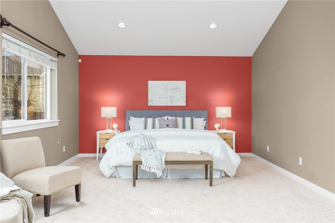 883 Jericho Place Northeast Renton, WA 98059 - Photo 19 of 30 a bed room with a bed and a chair