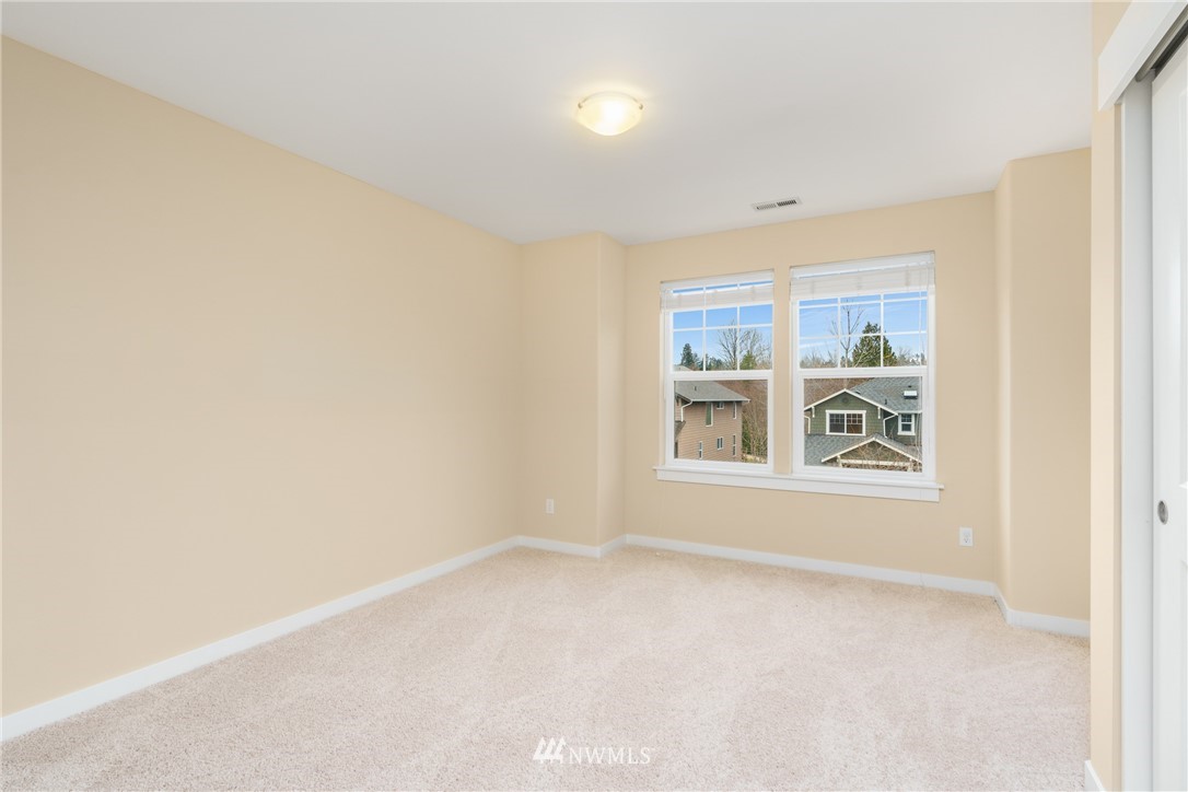 883 Jericho Place Northeast Renton, WA 98059 - Photo 24 of 30 an empty room with windows