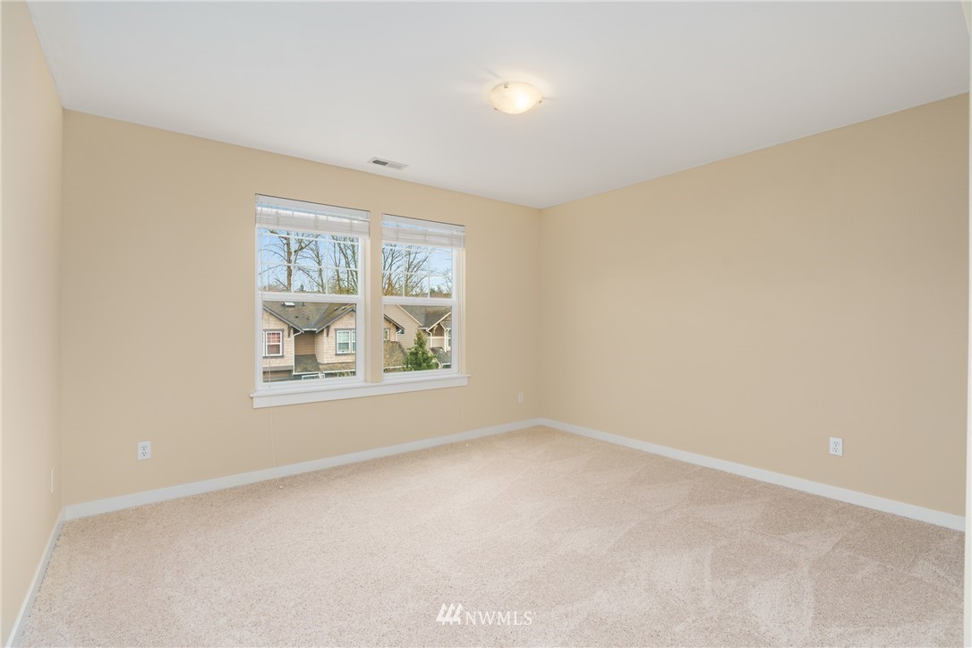 883 Jericho Place Northeast Renton, WA 98059 - Photo 26 of 30 an empty room with windows