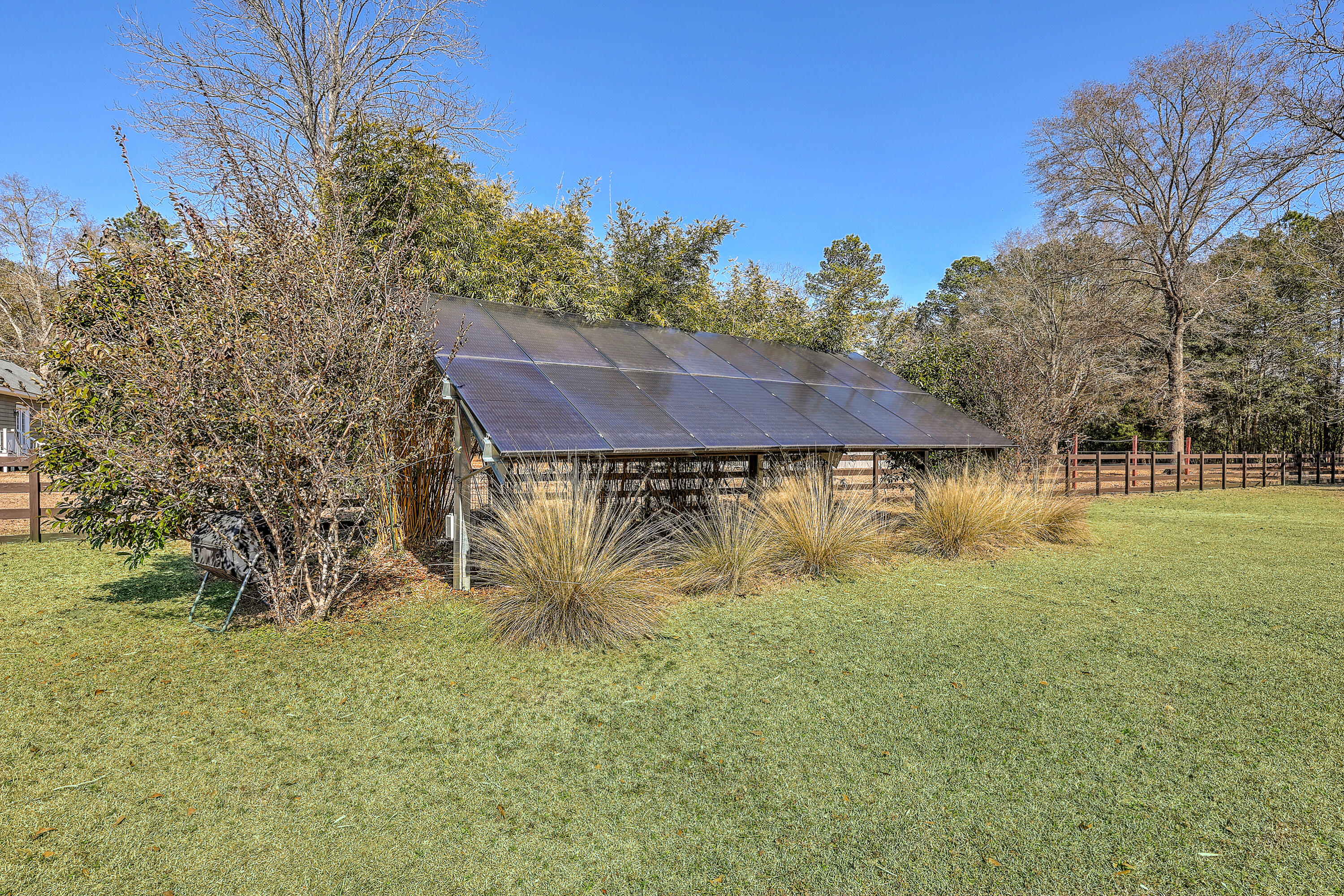 6968 Hyde Farm Road Ravenel, SC 29470 - Photo 44 of 68 Solar panels on property