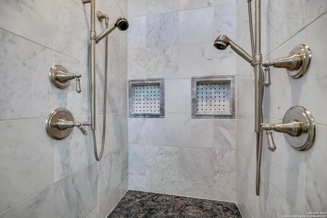 a view of an entryway door with a garden