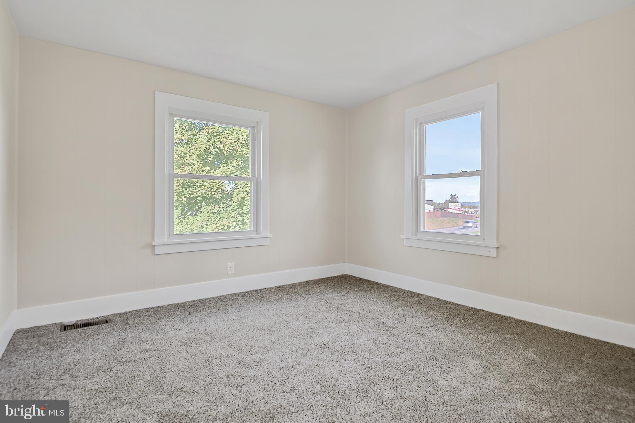 206 Hershey Road Hummelstown, PA 17036 - Photo 16 of 26 an empty room with windows