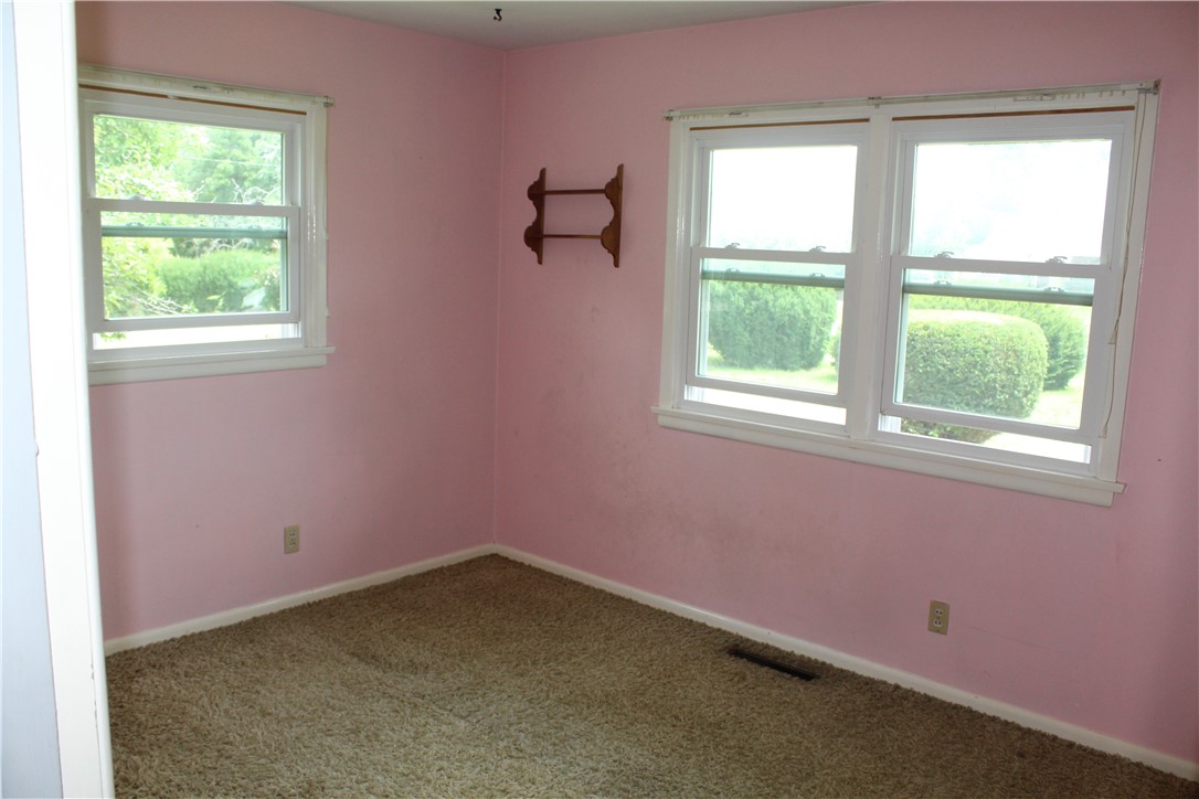 12735 Catlin Tilton Road Catlin, IL 61817 - Photo 10 of 22 an empty room with a window