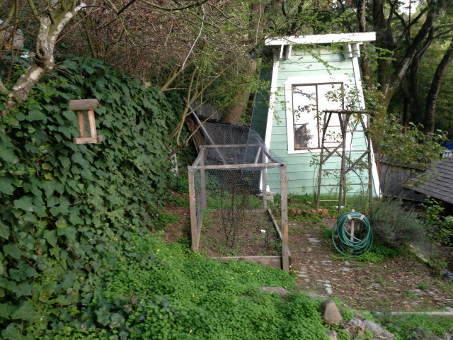 21394 Aldercroft Heights Road Los Gatos, CA 95033 - Photo 12 of 15 a backyard of a house with plants and outdoor seating