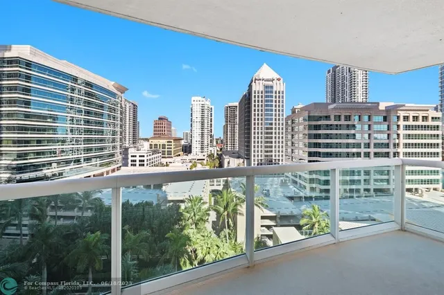 a view of a tall buildings from a balcony