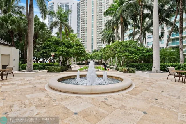 a view of a living room and entry way