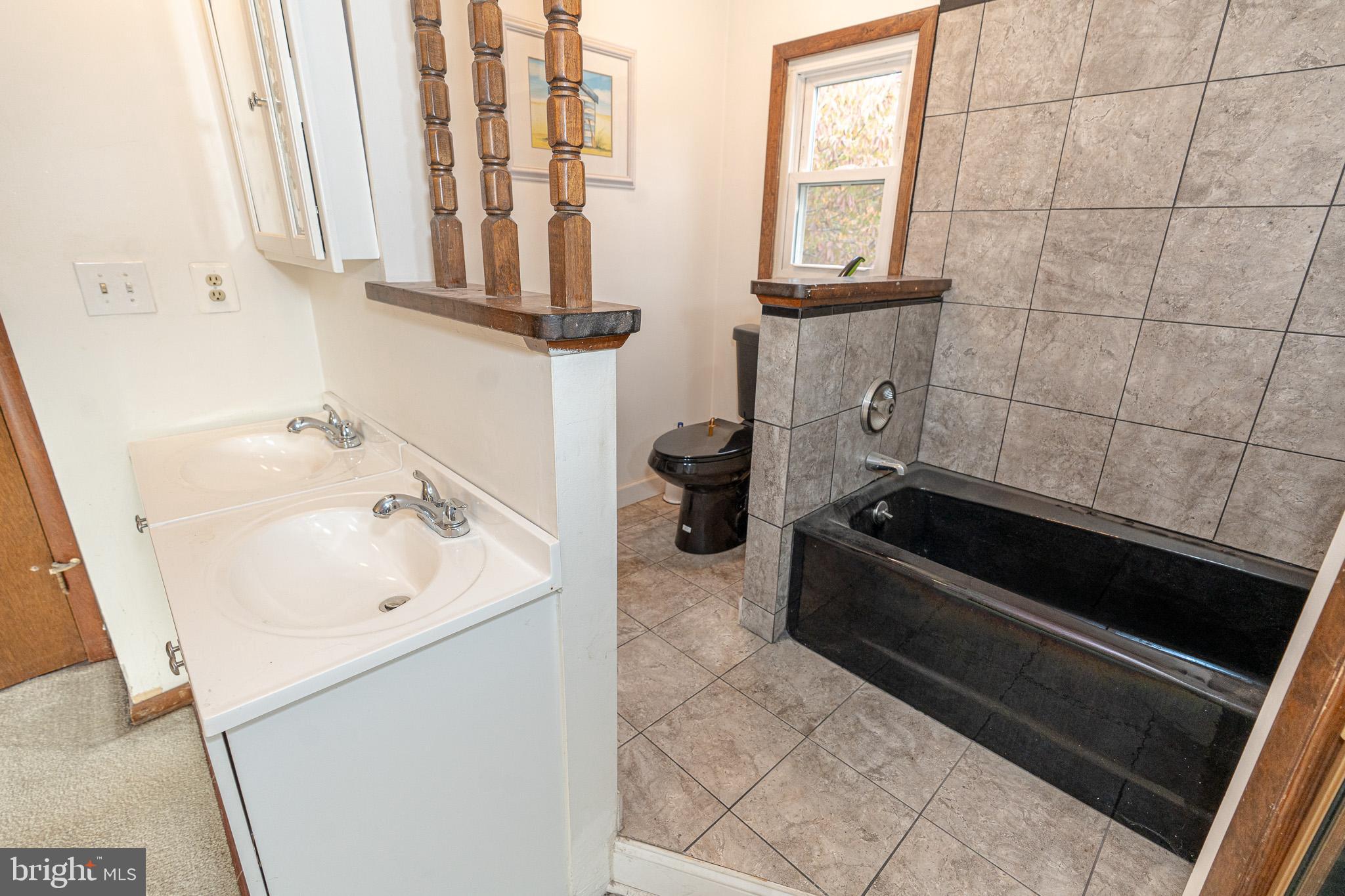 1913 Trout Farm Road Jarrettsville, MD 21084 - Photo 25 of 40 a bathroom with a sink and a bathtub