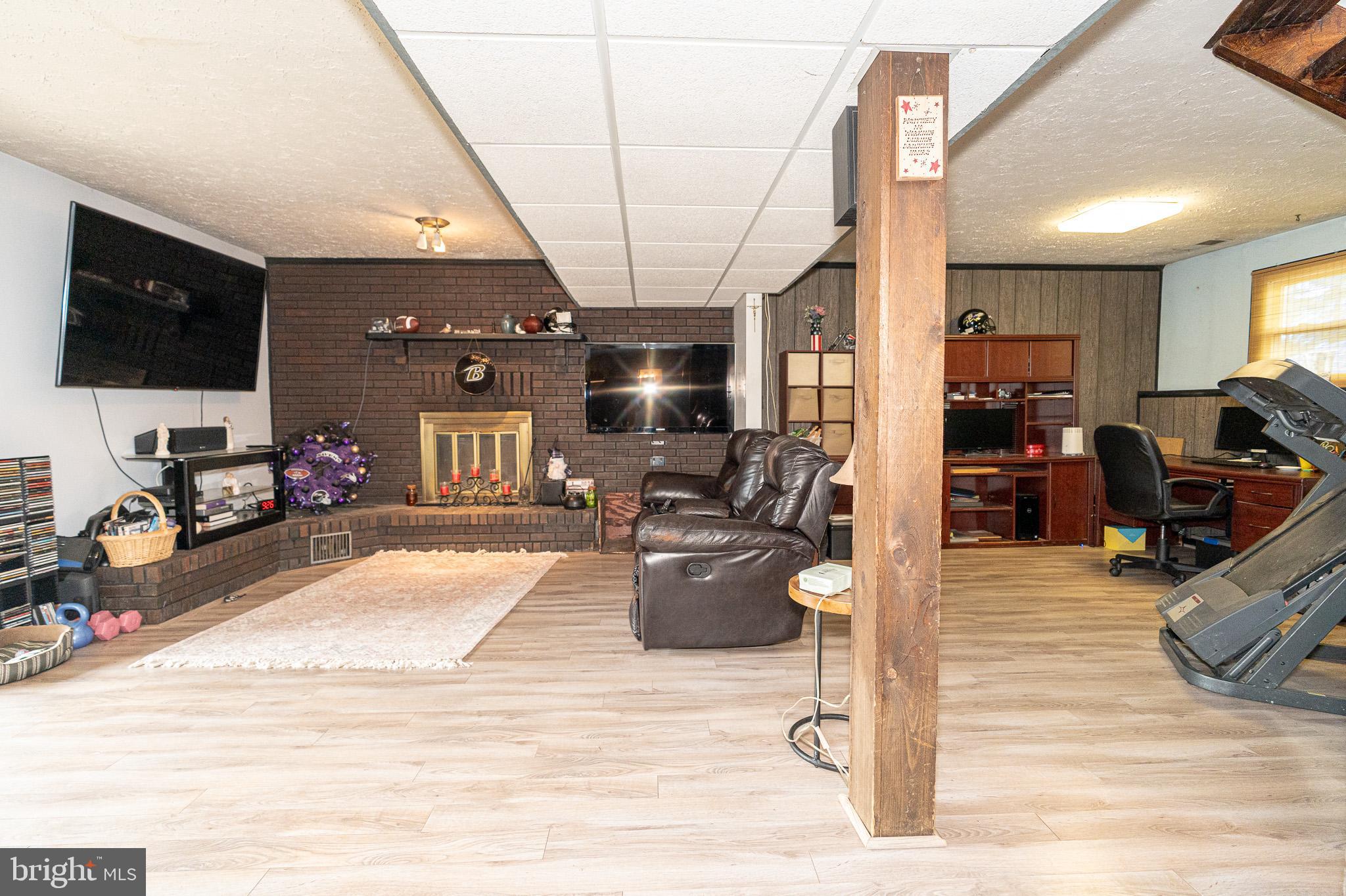 1913 Trout Farm Road Jarrettsville, MD 21084 - Photo 29 of 40 a living room with furniture and a flat screen tv