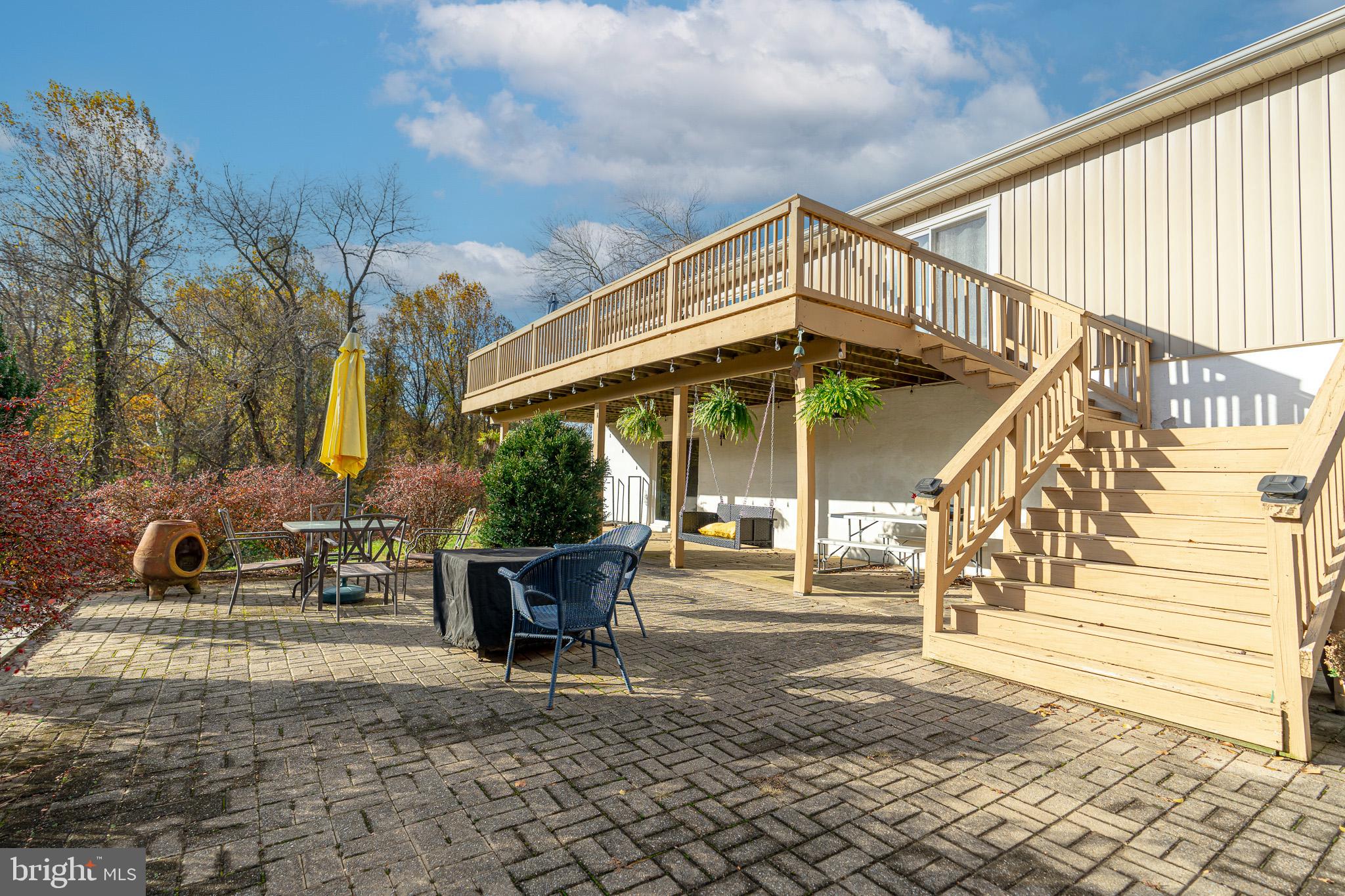 1913 Trout Farm Road Jarrettsville, MD 21084 - Photo 5 of 40 a view of a chair and tables in the patio of the house
