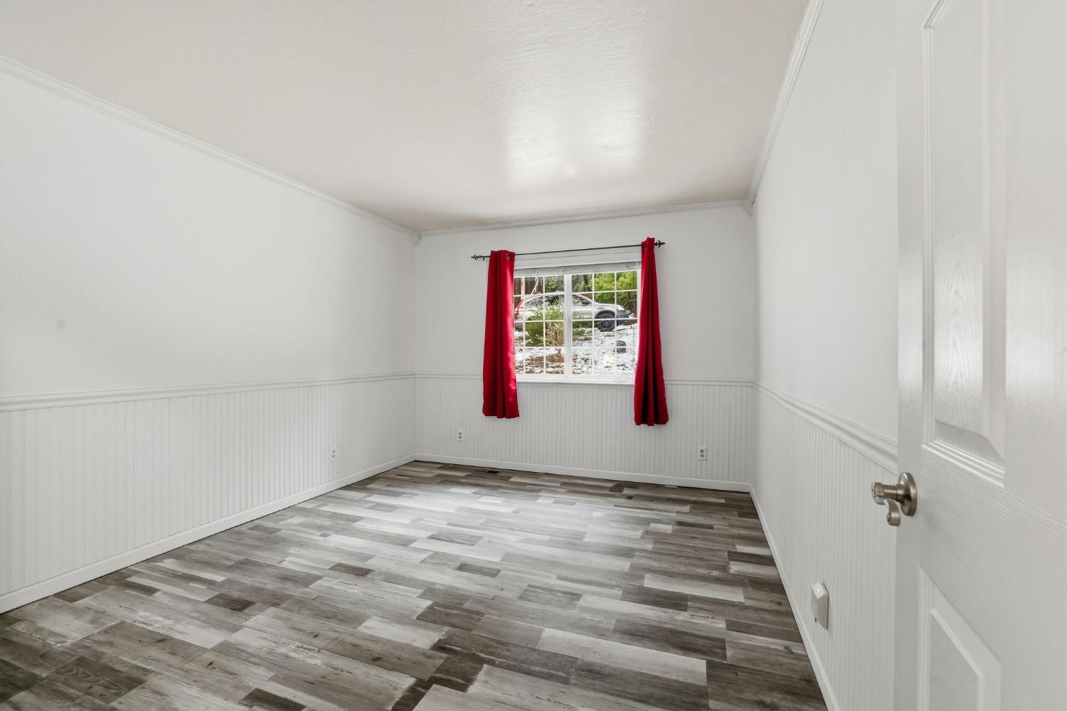 11002 Ball Road Grass Valley, CA 95949 - Photo 15 of 34 an empty room with windows