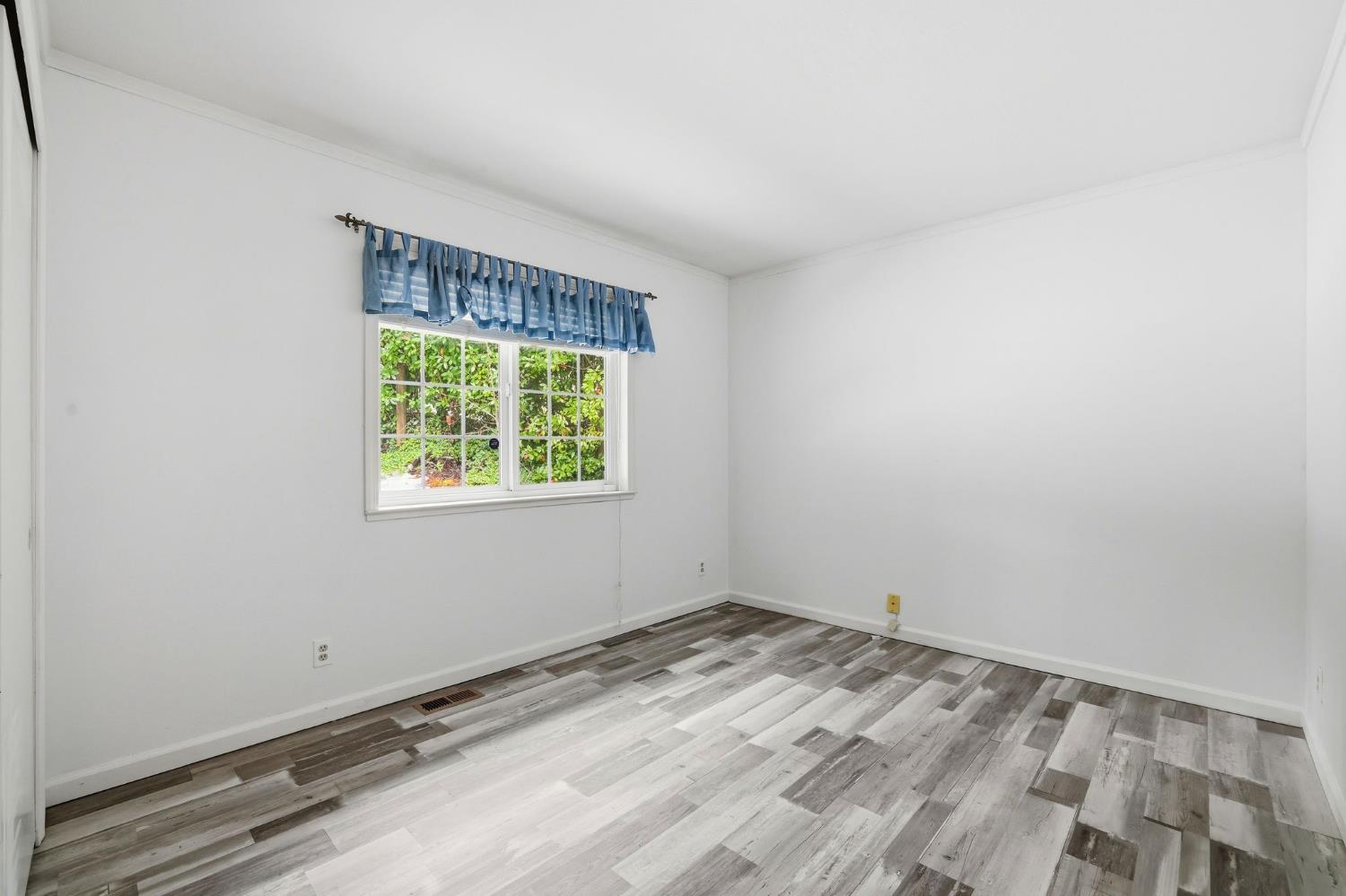 11002 Ball Road Grass Valley, CA 95949 - Photo 16 of 34 an empty room with a window