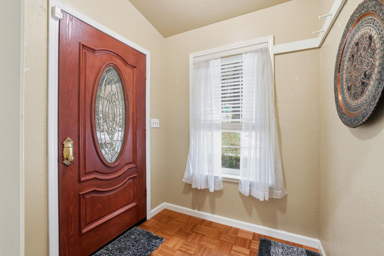 11002 Ball Road Grass Valley, CA 95949 - Photo 2 of 34 a view of a entryway door with wooden floor
