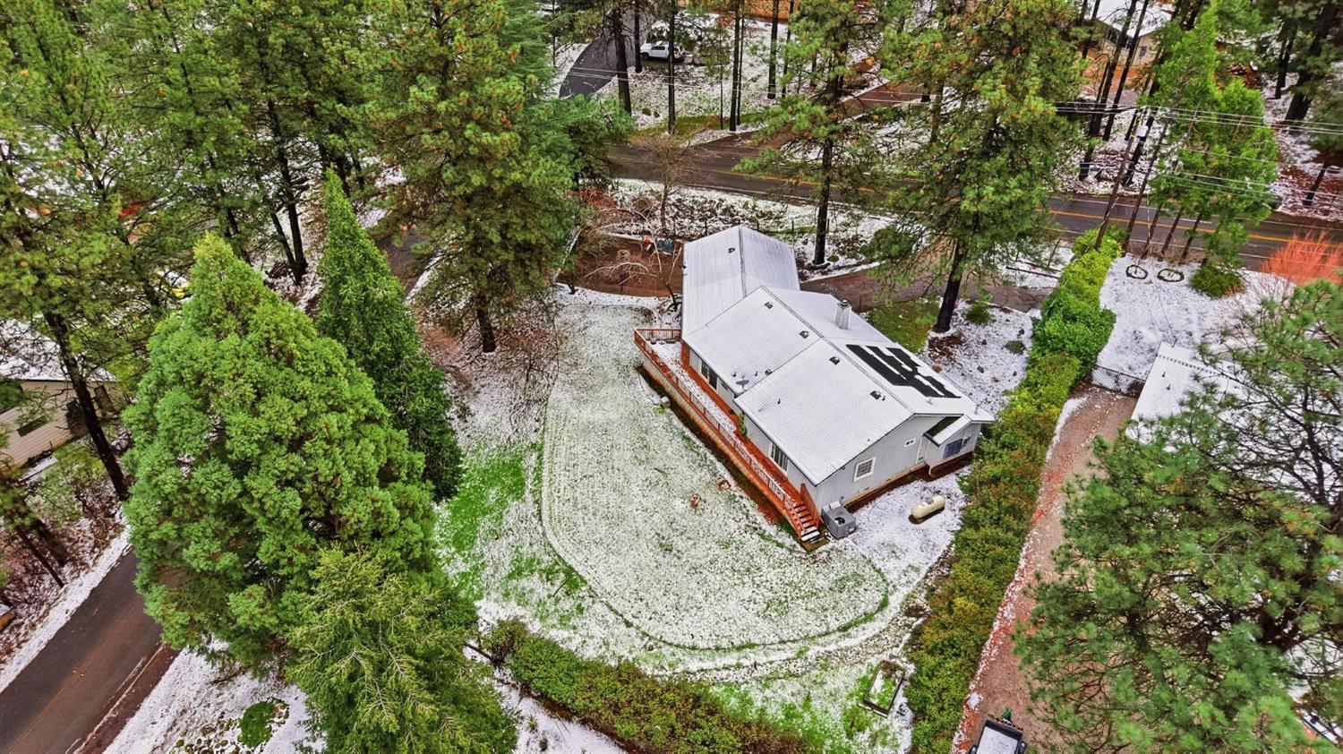11002 Ball Road Grass Valley, CA 95949 - Photo 33 of 34 an aerial view of a house with a yard and large trees