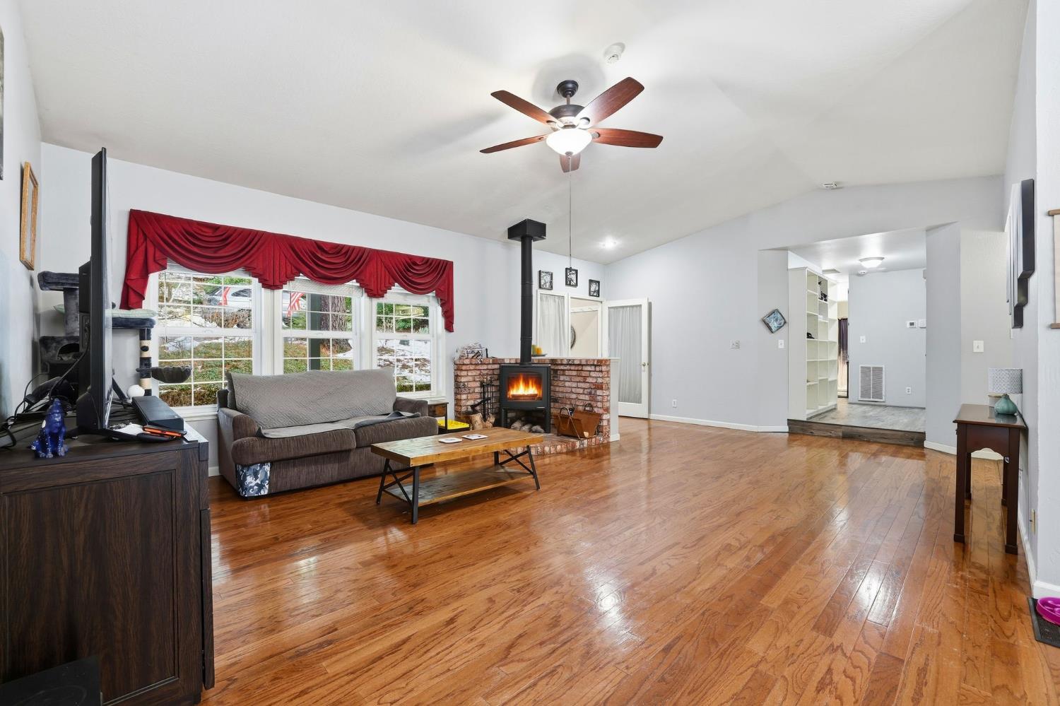 11002 Ball Road Grass Valley, CA 95949 - Photo 5 of 34 a living room with furniture and wooden floor