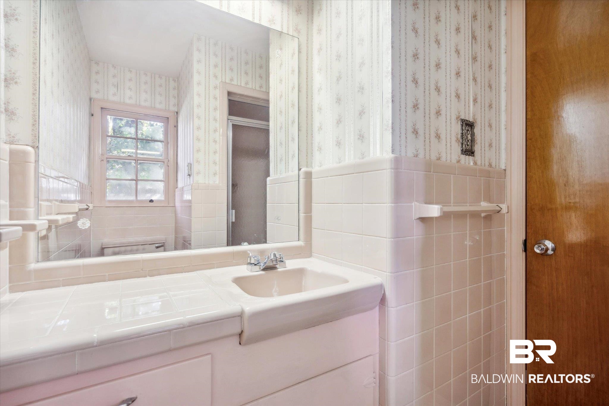 1252 Helm Circle Mobile, AL 36693 - Photo 13 of 18 Bathroom with tile walls, toilet, and vanity