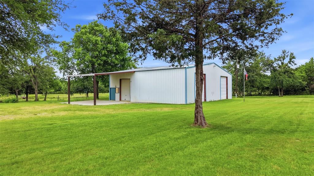 2700 Randell Lake Road Denison, TX 75020 - Photo 12 of 39 Scattered trees and spacious yard to enjoy nature.
