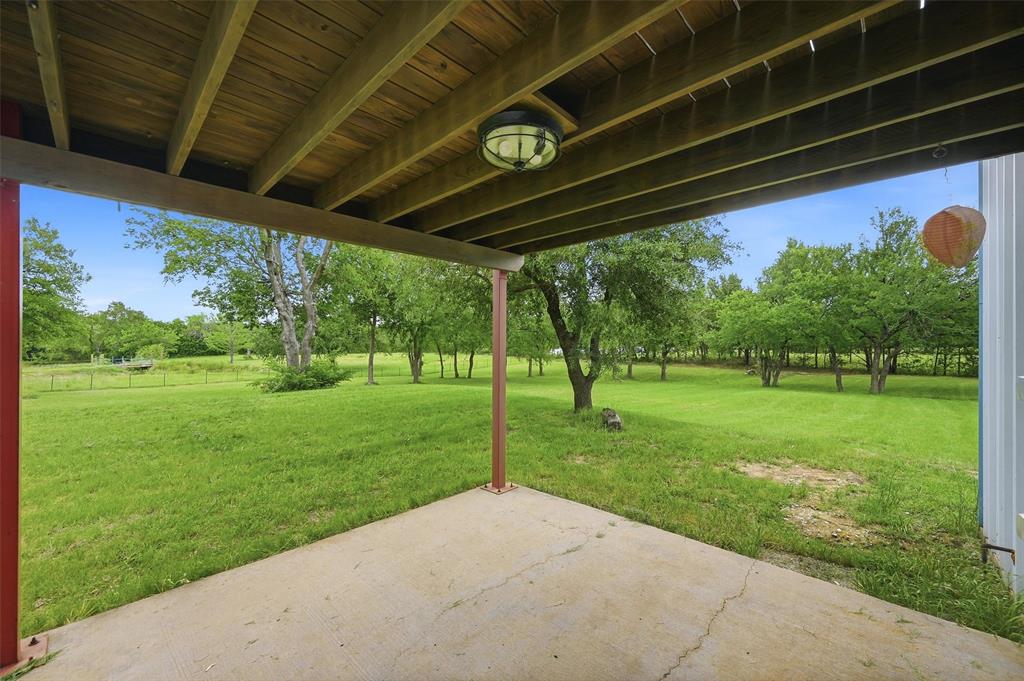 2700 Randell Lake Road Denison, TX 75020 - Photo 14 of 39 a view of a porch with a big yard