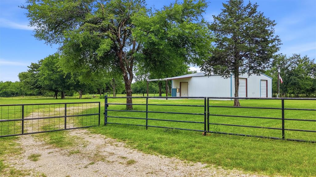 2700 Randell Lake Road Denison, TX 75020 - Photo 2 of 39 Gate with keypad entry.