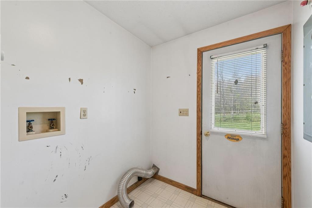 136 Bottom Road Mill Run, PA 15464 - Photo 8 of 26 a small space with a window