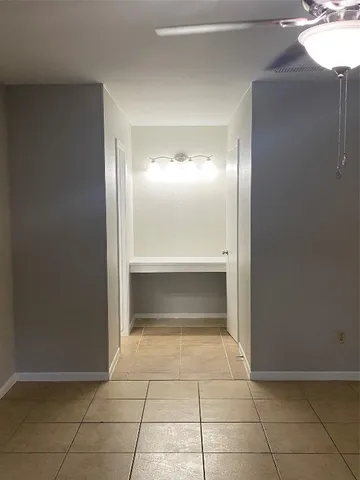 a bathroom with a sink and vanity