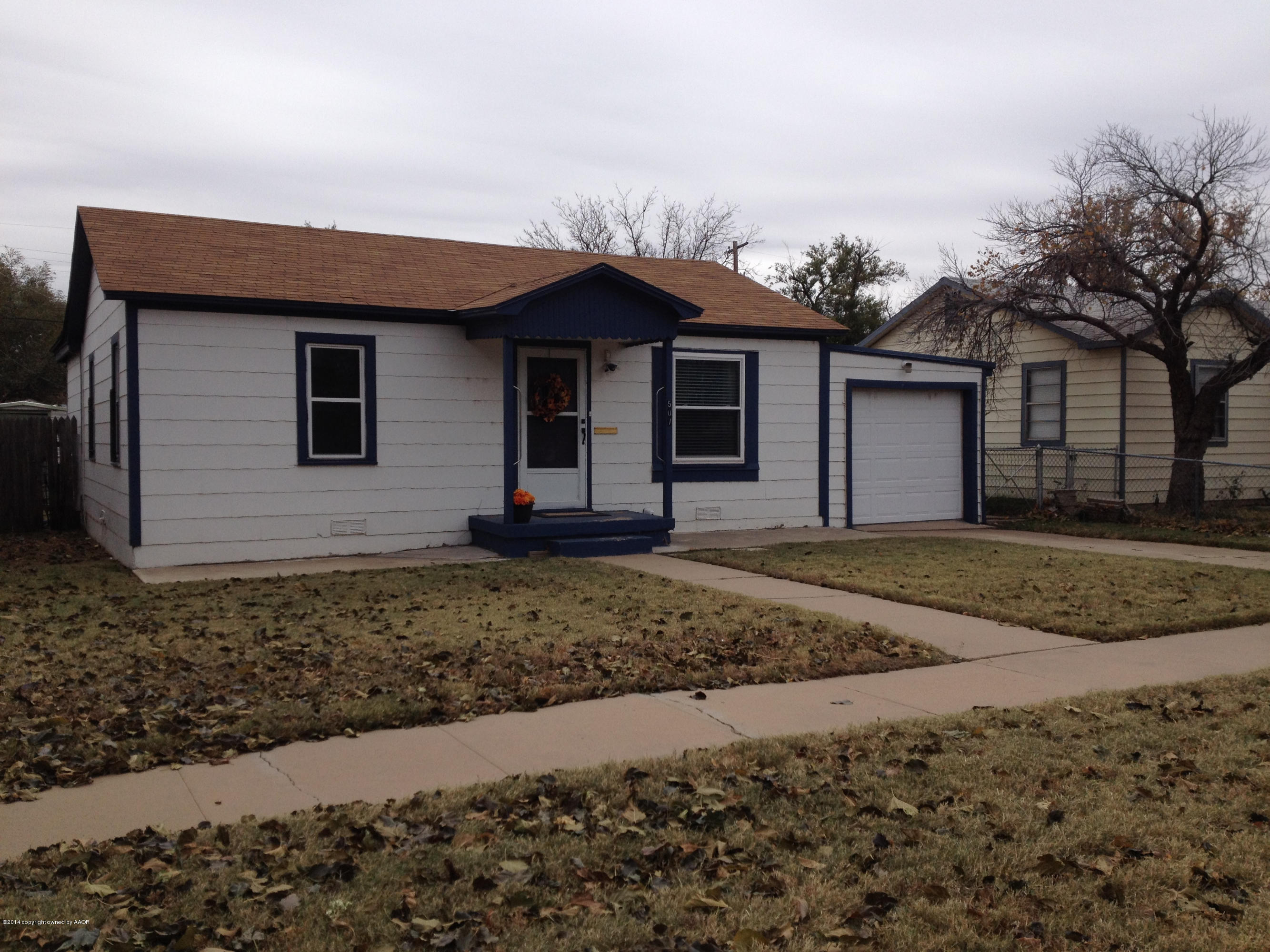 507 Southwest 44th Avenue Amarillo, TX 79110 - Photo 1 of 11 a view of a house with a yard