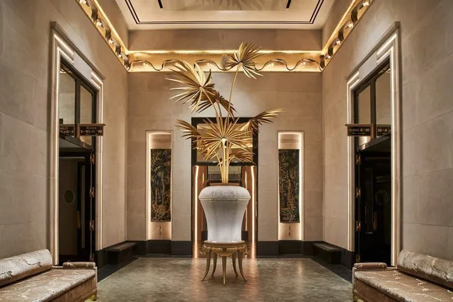 a view of a livingroom with a car parked front door