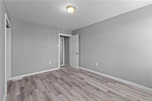 363 44th Street Pittsburgh, PA 15201 - Photo 11 of 14 a view of room with wooden floor