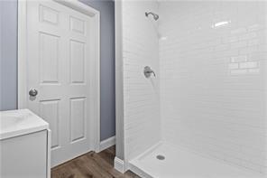 363 44th Street Pittsburgh, PA 15201 - Photo 8 of 14 a bathroom with a shower