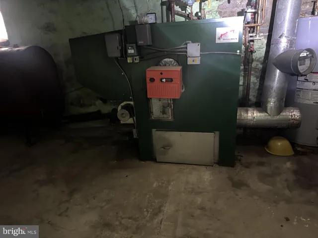 a front view of a house with a street