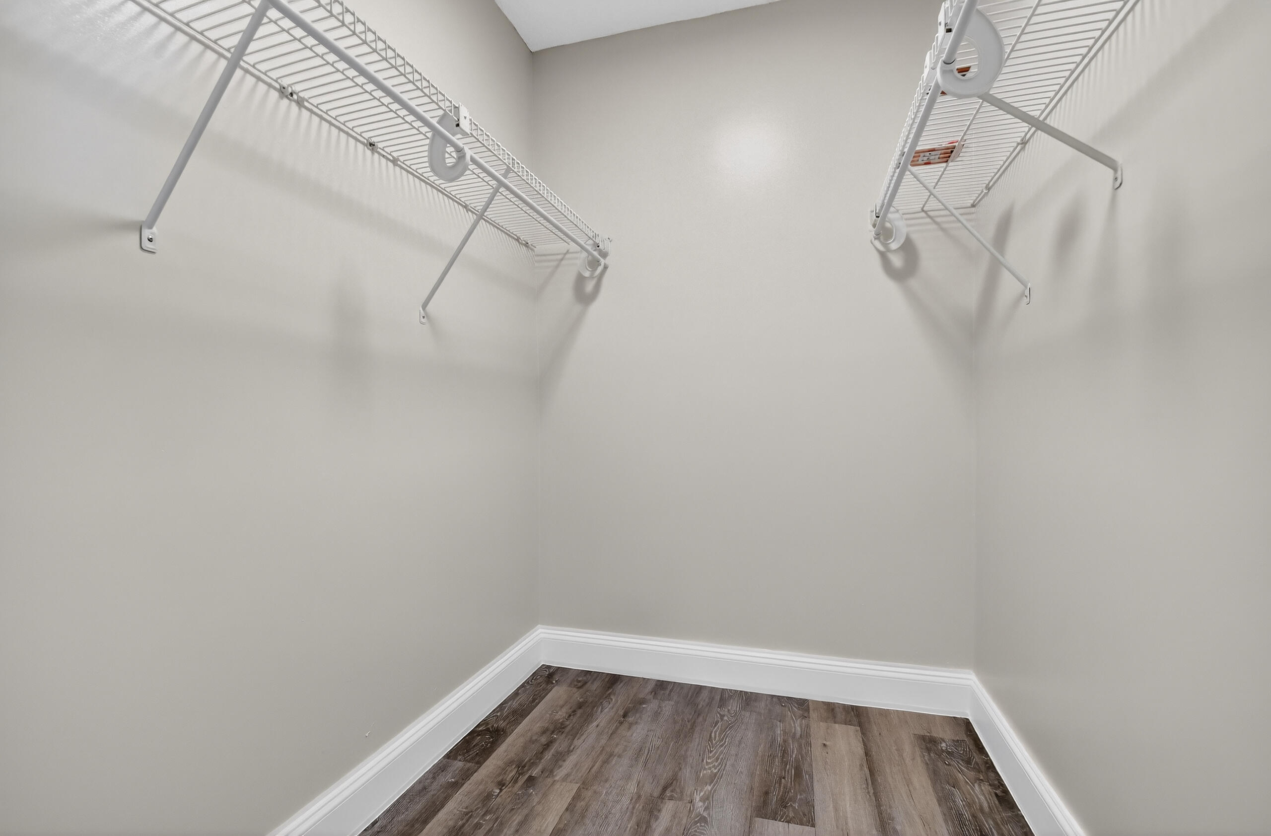 484 Springdale Circle, Unit 48D Palm Springs, FL 33461 - Photo 26 of 59 a view of a room with racks on the wall