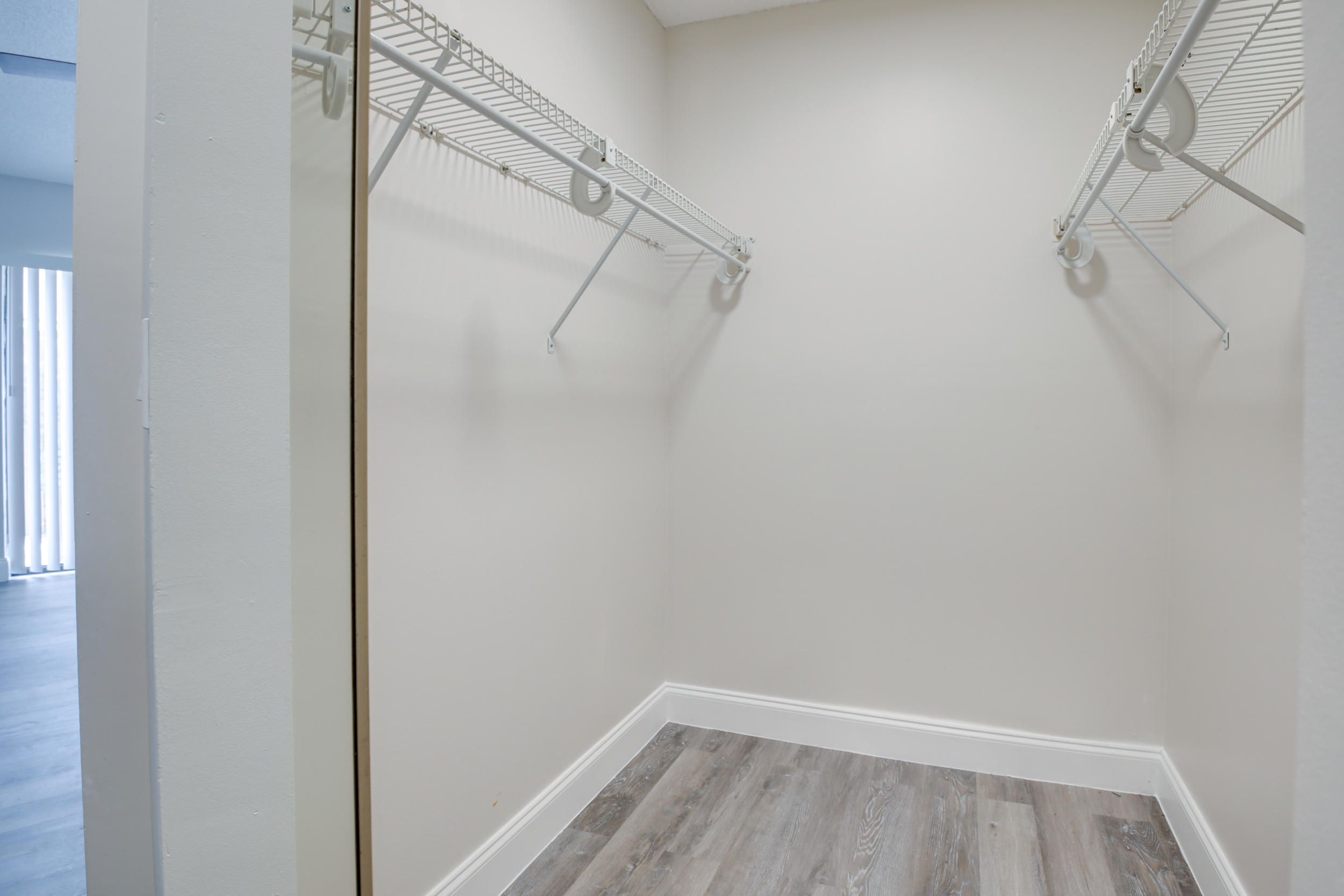 484 Springdale Circle, Unit 48D Palm Springs, FL 33461 - Photo 27 of 59 a view of a room with racks on the wall