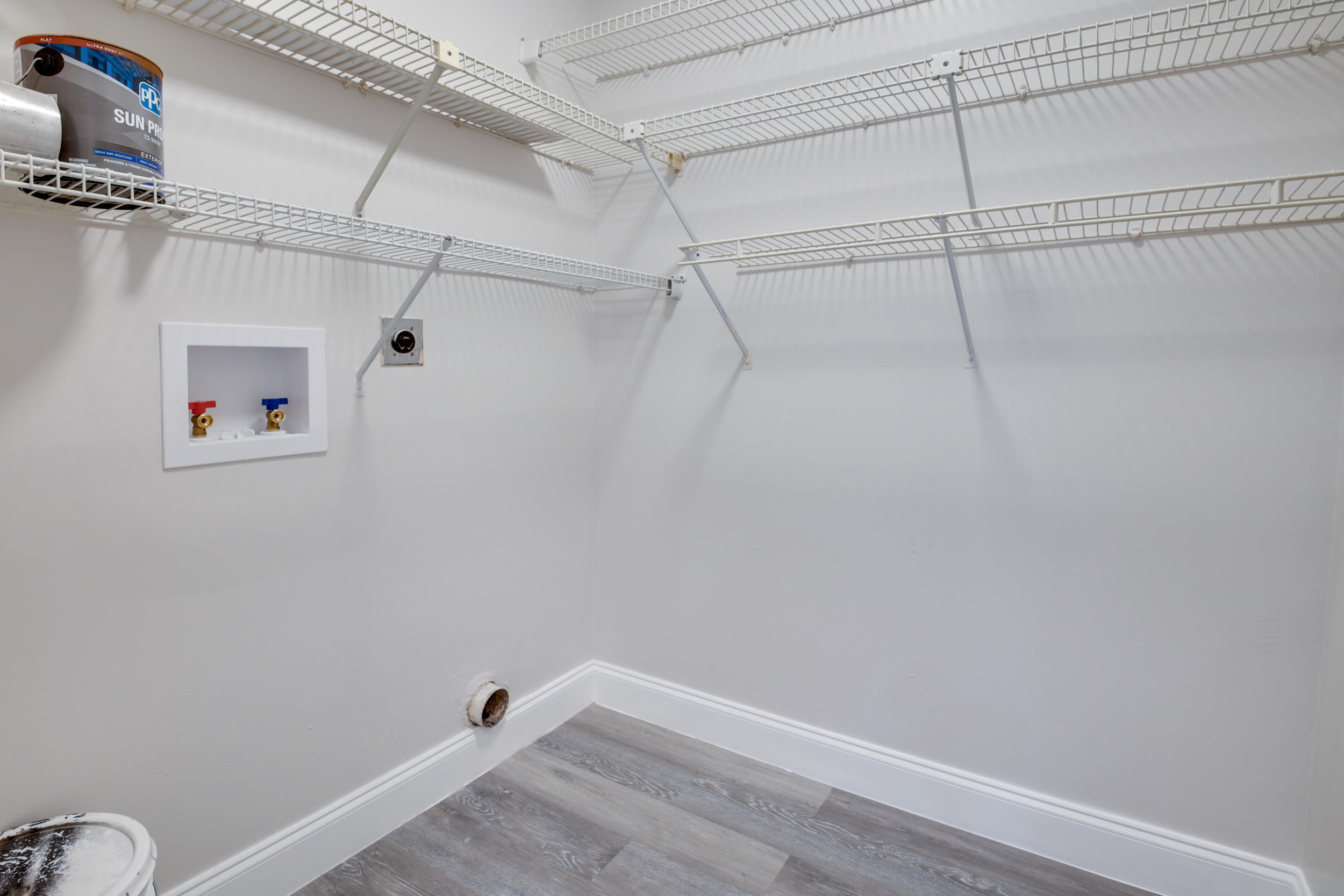 484 Springdale Circle, Unit 48D Palm Springs, FL 33461 - Photo 28 of 59 a view of a room with racks on the wall