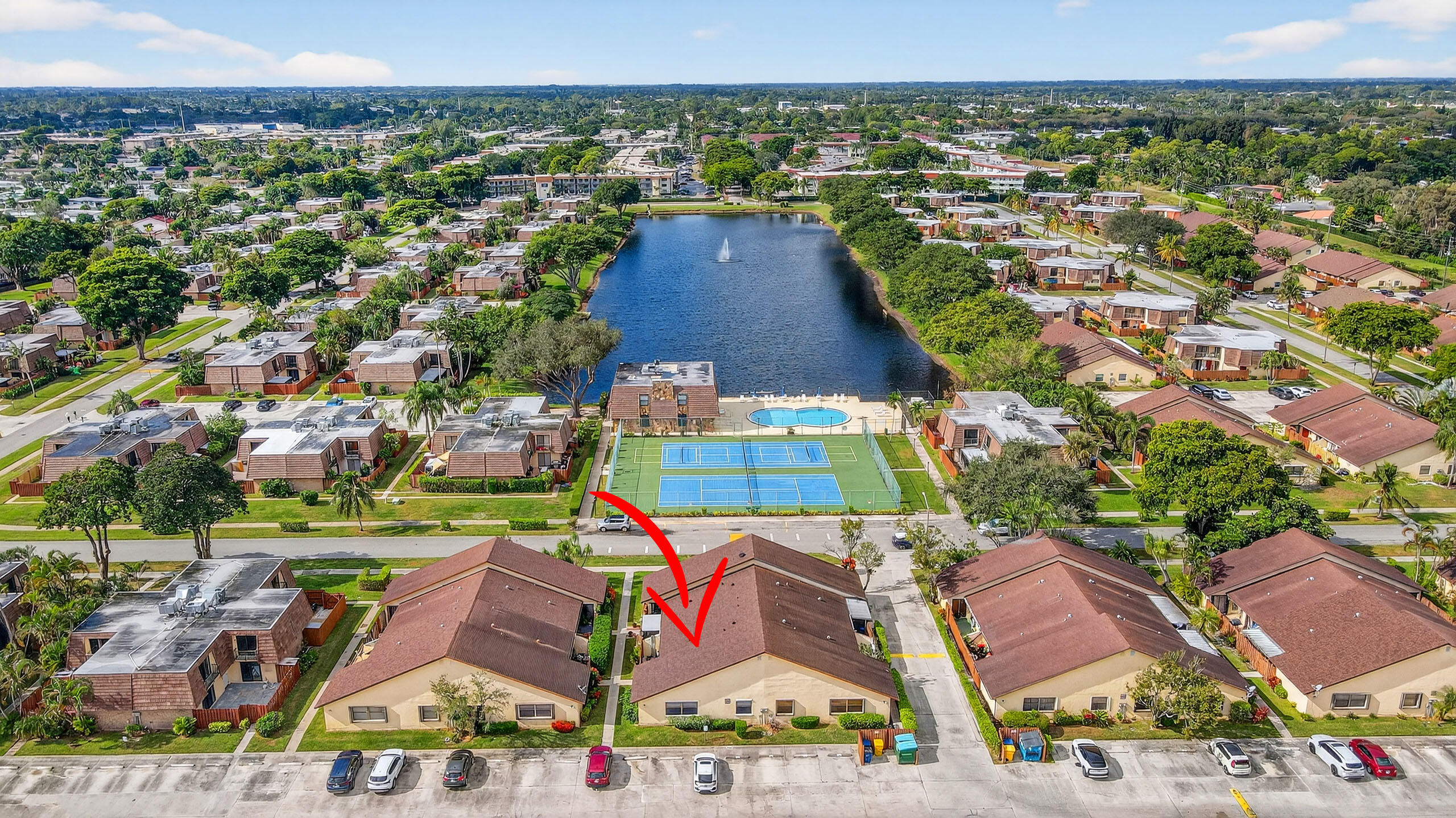 484 Springdale Circle, Unit 48D Palm Springs, FL 33461 - Photo 51 of 59 an aerial view of residential houses with outdoor space and swimming pool