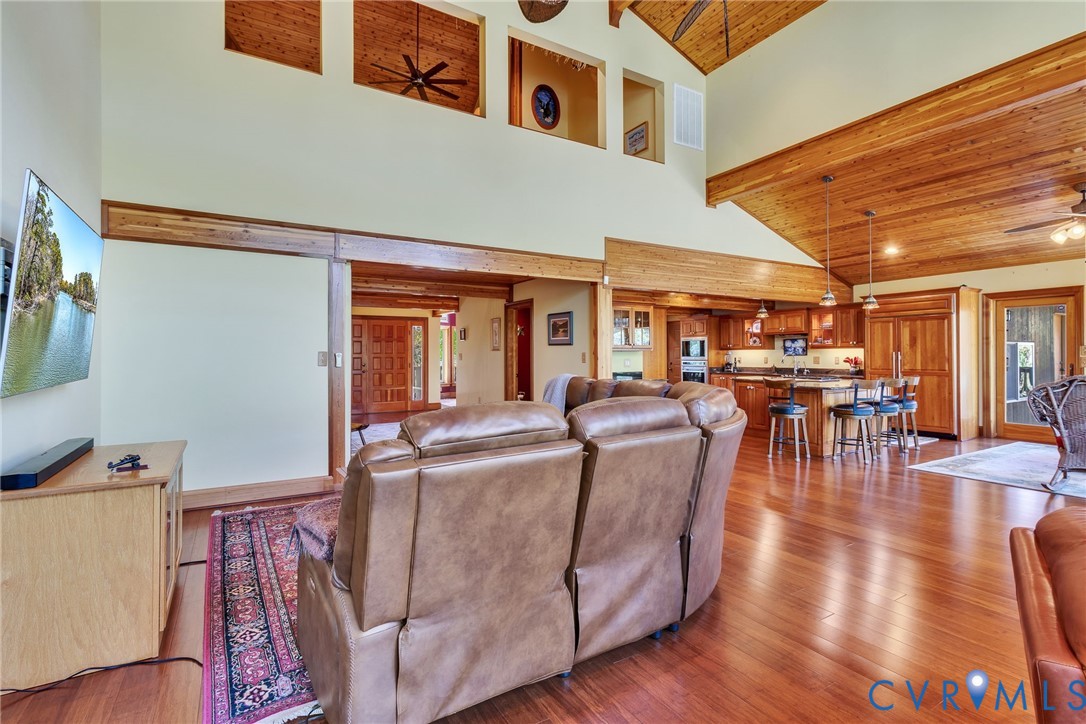 176 Baypointe Court Reedville, VA 22539 - Photo 21 of 60 a living room with furniture and wooden floors