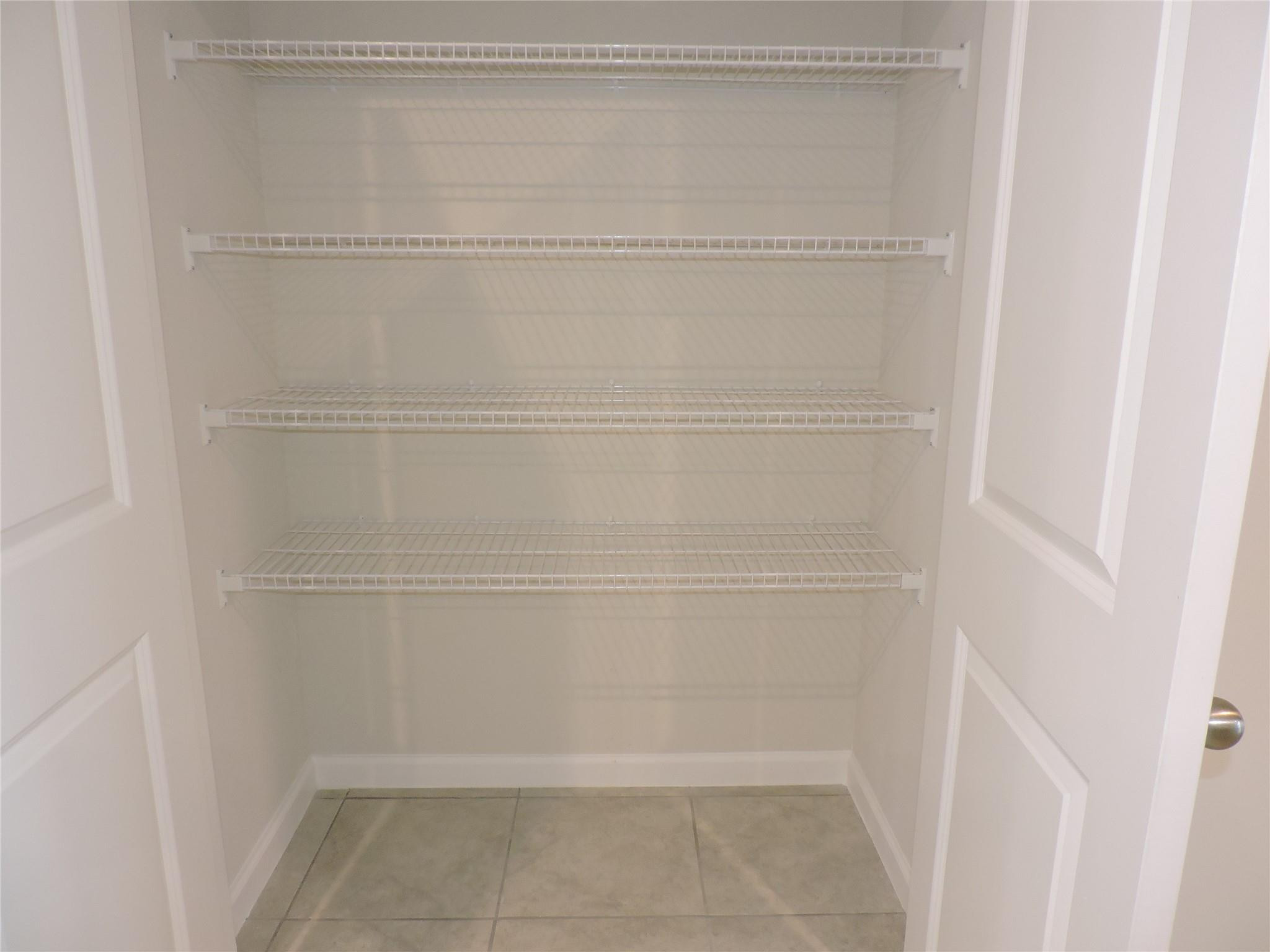 836 Persimmon Place Fort Pierce, FL 34981 - Photo 20 of 78 LARGE PANTRY CLOSET