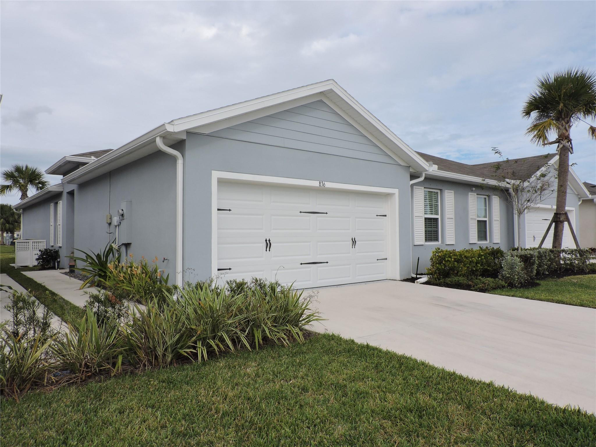 836 Persimmon Place Fort Pierce, FL 34981 - Photo 2 of 78 EXTERIOR FRONT