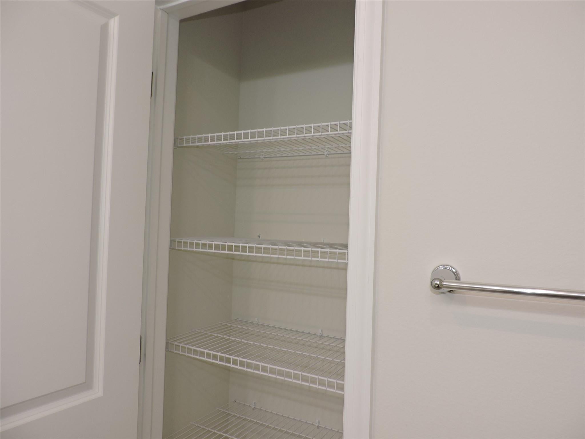 836 Persimmon Place Fort Pierce, FL 34981 - Photo 36 of 78 PRIMARY BATHROOM WITH LINEN CLOSET
